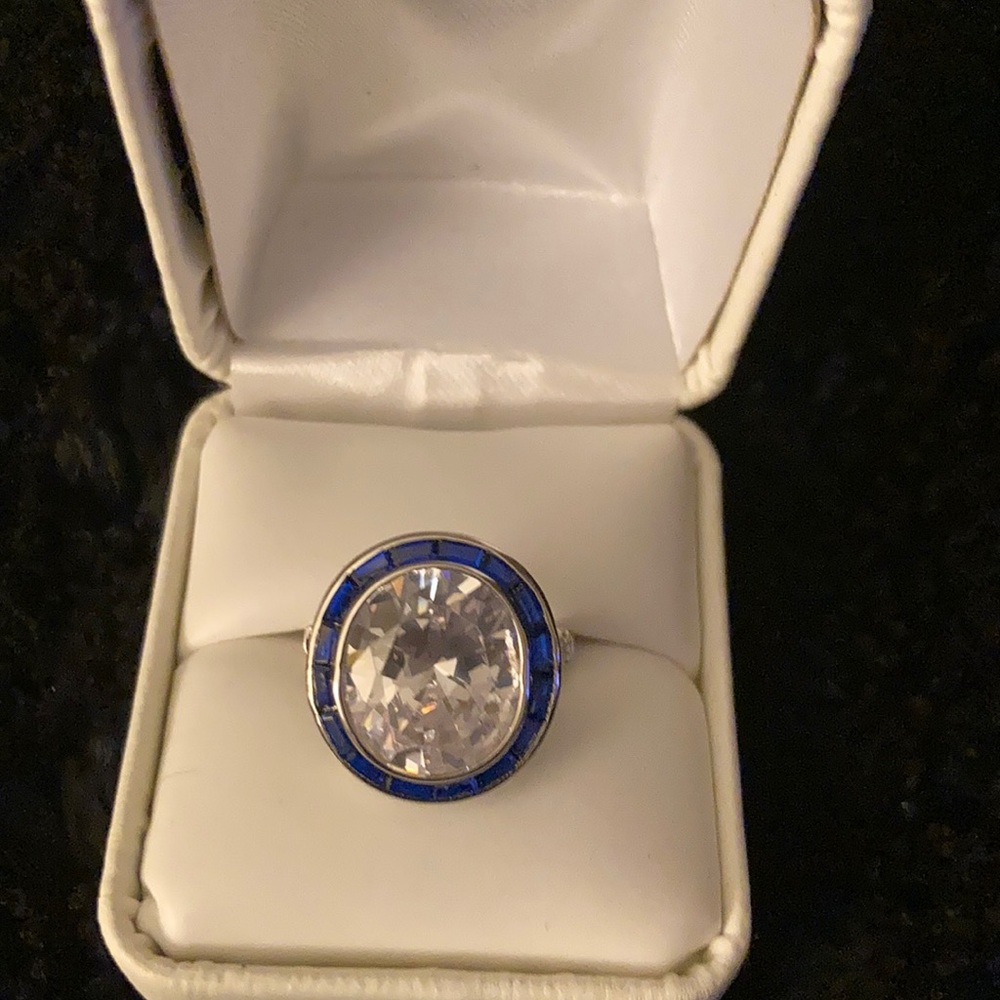 White sapphire and blue sapphire sterling silver ring.